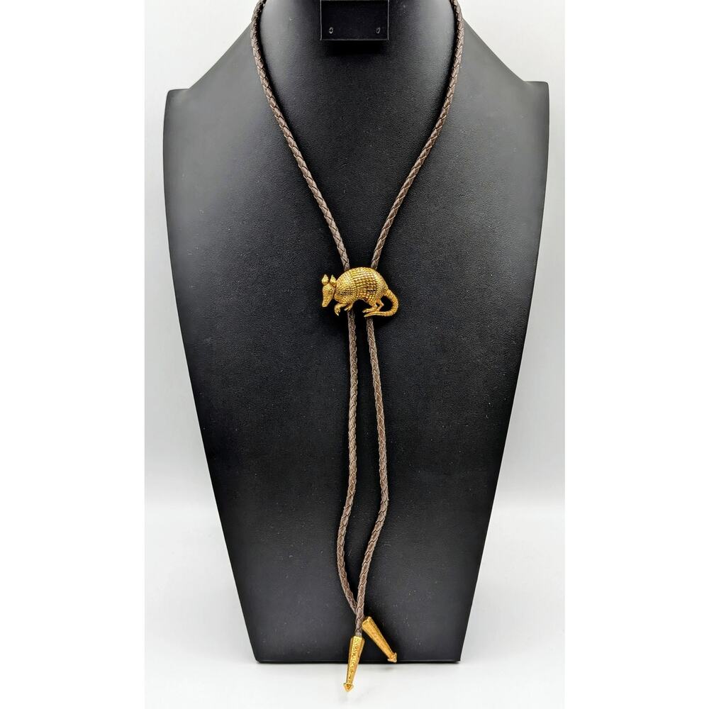 Para Gold Tone Armadillo Brown Leather Braided Bolo Tie